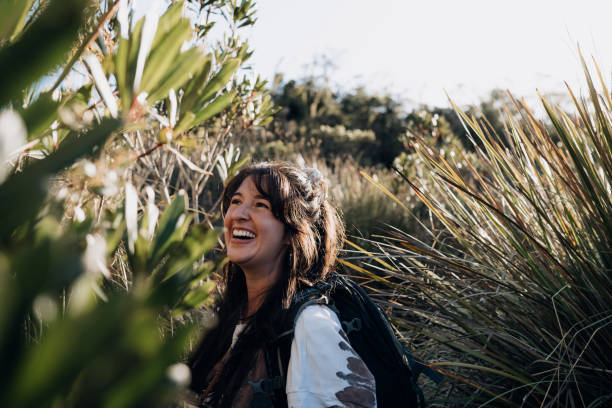 Smiling woman on the trail Smiling woman on the trail mantiqueira mountains stock pictures, royalty-free photos & images