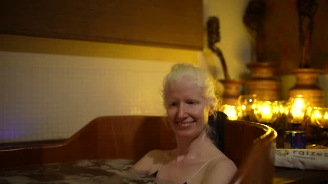 Portrait of a mature woman in a bathtub at a spa