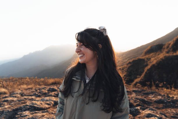 istock Smiling woman in the mountains 1455601678