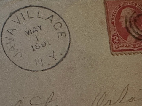 Closeup of antique postmarked envelope with 2-cent George Washington stamp.  Postmarked JAVA VILLAGE MAY 1 1891.