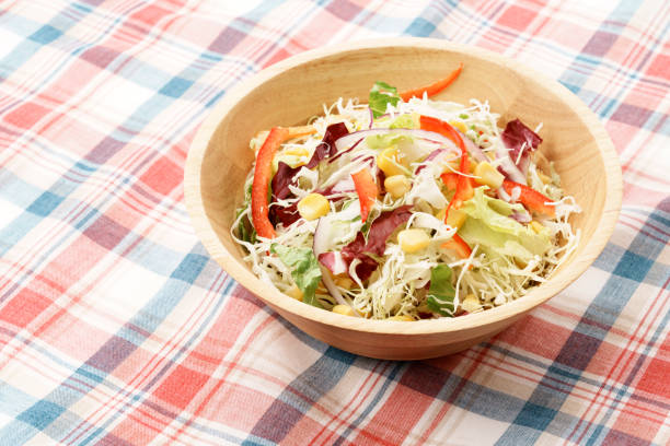istock Shredded cabbage and colorful vegetable salad 1455603524