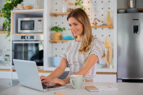 istock Young woman working from home 1455607516
