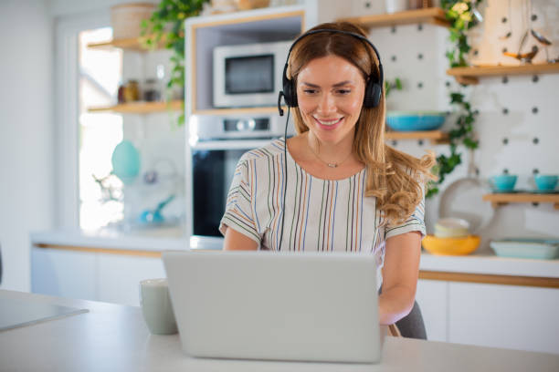 istock Young woman working from home 1455607584