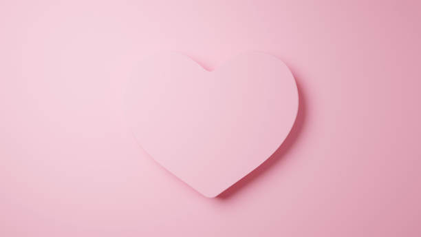 istock 3D Illustration.Pink hearts on pink background. 1455608299