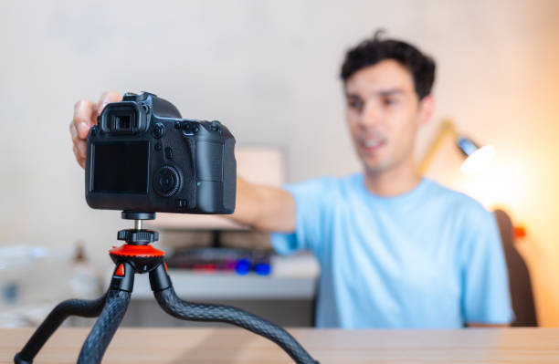 istock Turning on camera to record a video 1455608489