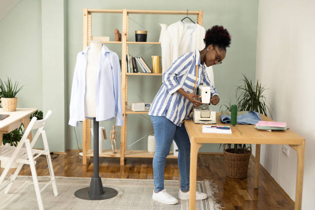 istock African American young woman designing clothes at her studio 1455609655