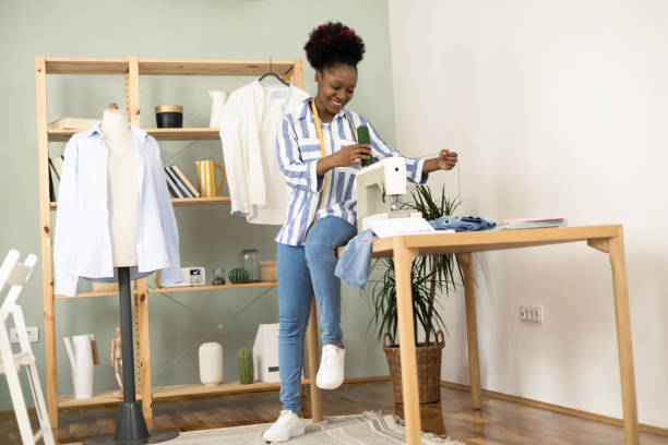 istock African American tailor making clothes at her sewing studio 1455610088
