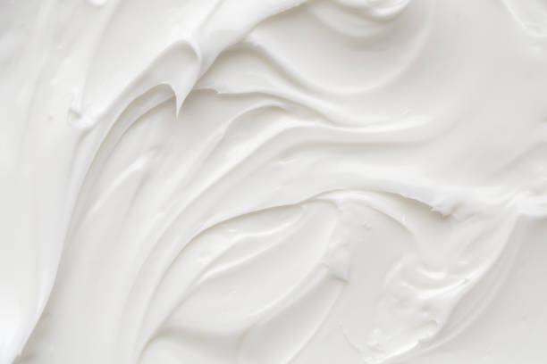 weiße lotion schönheit hautpflegecreme textur kosmetischer produkthintergrund - creme stock-fotos und bilder