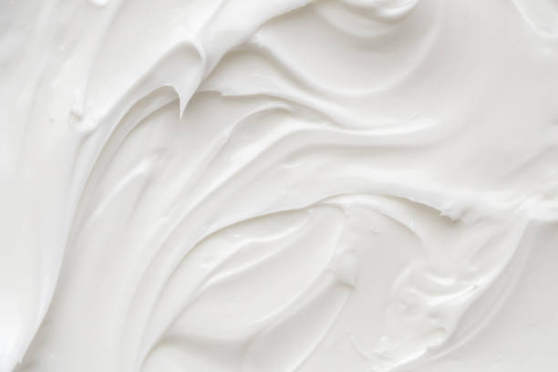 White lotion beauty skincare cream texture cosmetic product background White lotion beauty skincare cream texture cosmetic product background whipped food stock pictures, royalty-free photos & images