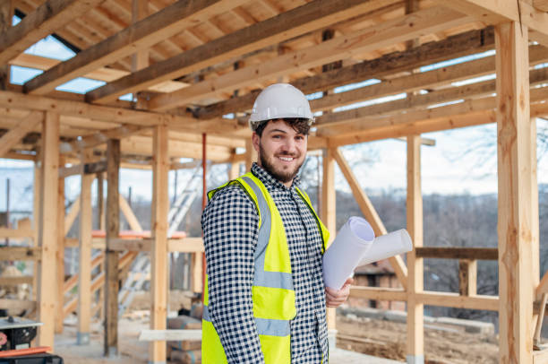 istock Portrait of a smiling architect at construction site. 1455612541