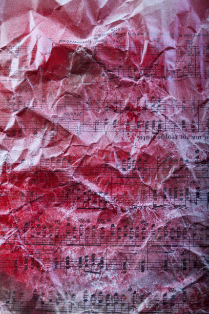 istock Bloody notes on creased paper. Blood on notes on creased paper. Red spray on notes 1455620437