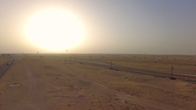 sunrise over sandy sahara desert - UAE