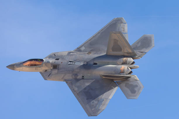 istock F-22 Raptor in a turn in beautiful light 1455631913