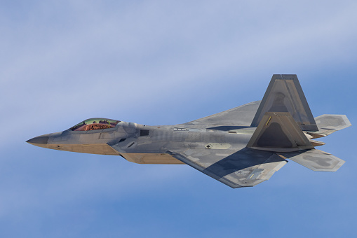 Close side view of a F-22 Raptor in beautiful light