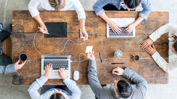 istock Overhead Small Business Meeting 1455632048