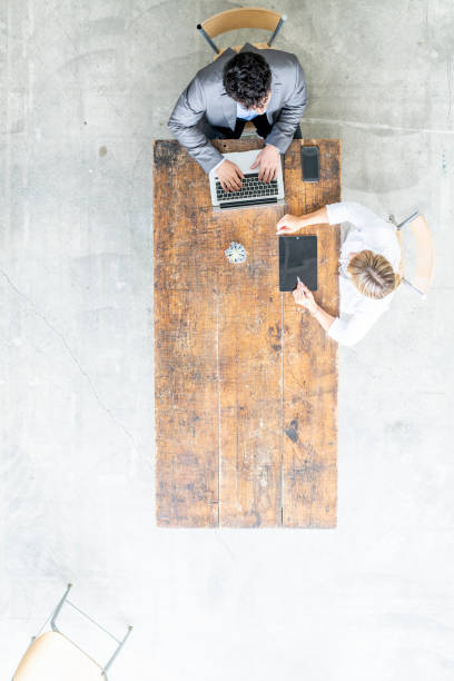 istock Overhead Small Business Meeting 1455632071
