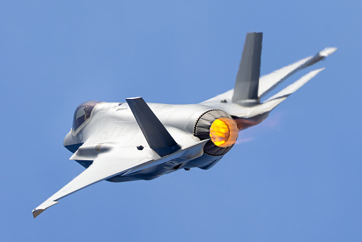 Tail view of a F-35A Lightning II  with afterburner on