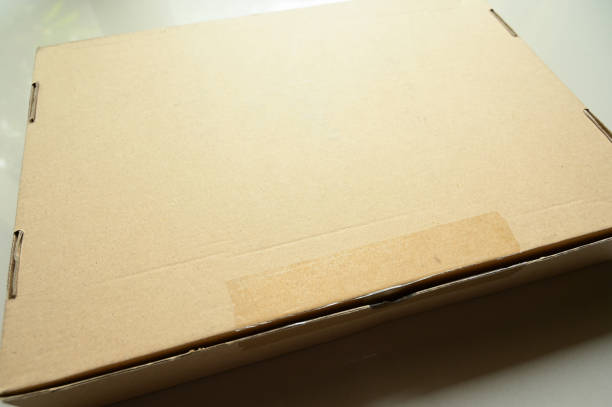 istock brown box packaging for shipping, paper textured 1455638683