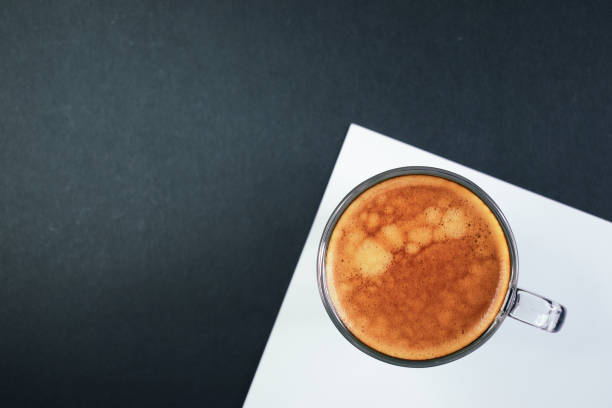 istock hot black coffee put on white and black table, freshness hot coffee 1455638744