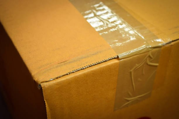 istock brown box packaging for shipping, paper textured 1455638775