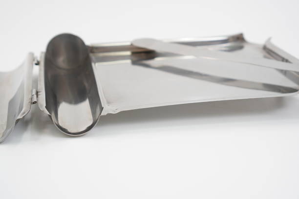 istock An image showing a pill counting tray for counting pills for use in a medical facility on a white background, close up. 1455651069