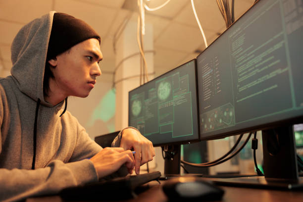 istock Male hacker trying to break into government network 1455654612