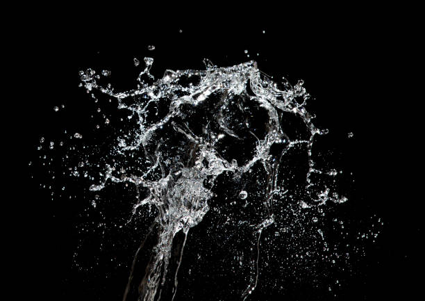 istock Shape form throw of Water splashes into drop water attack fluttering in air and stop motion freeze shot. Splash Water for explosion texture graphic resource elements, black background isolated 1455655683