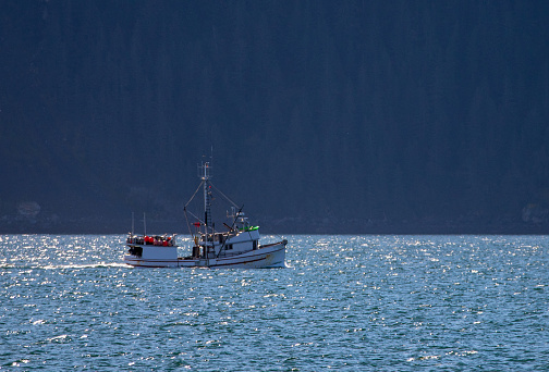 Fishing boat in Resurrection Bay in Kenai Fjords National Park near Seward Alaska United States