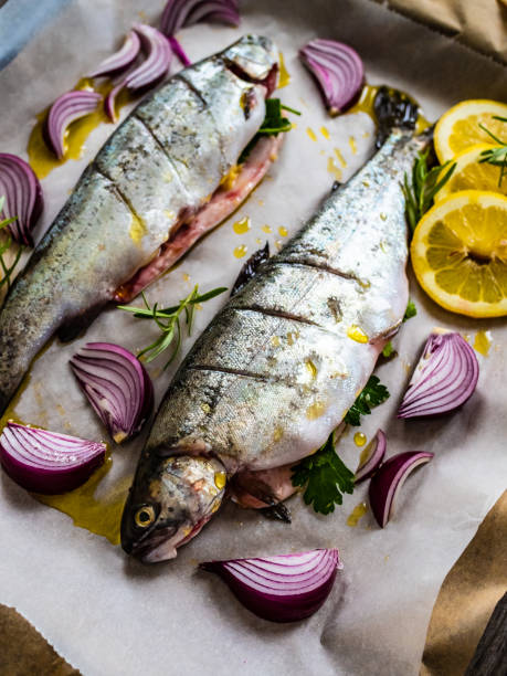 istock Fish dish - prepared raw trout to cook 1455656807