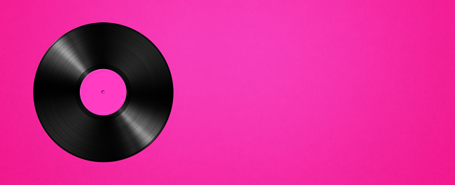 Vinyl record isolated on pink background. Horizontal banner. 3D illustration