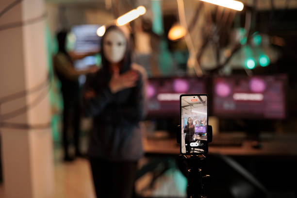 istock Hacking thief filming live ransomware video late at night 1455656825