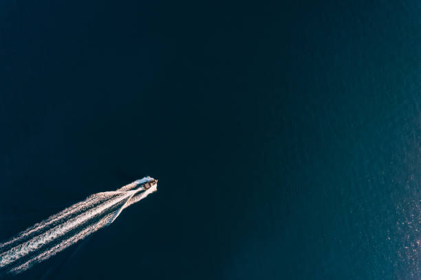 istock Drone View Fast-Moving Motorboat on the Sea 1455656831
