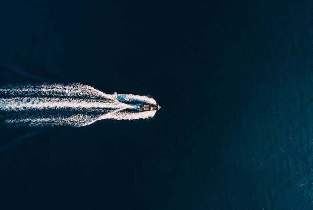 istock Drone View Fast-Moving Motorboat on the Sea 1455656838