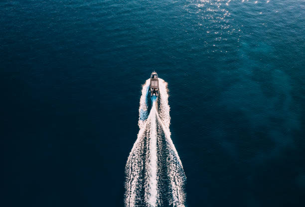 istock Drone View Fast-Moving Motorboat on the Sea 1455656849