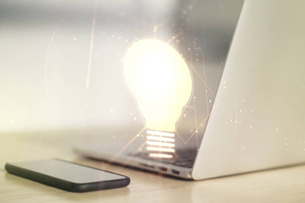 istock Creative idea concept with light bulb illustration on modern laptop background. Multiexposure 1455657849