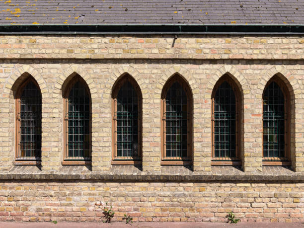 istock An old church with medieval windows at daylight 1455657976