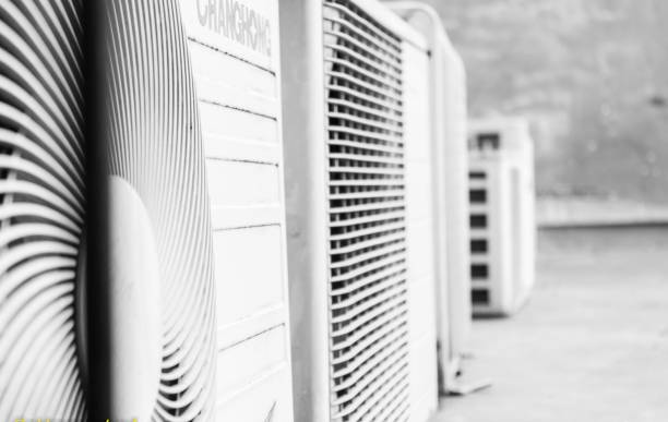 three ac exhaust fans three ac exhaust fans placed in parallel rooftop exhaust fan stock pictures, royalty-free photos & images