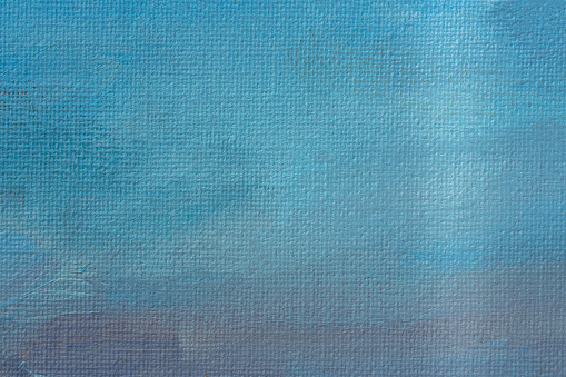 Blue background oil paint. Beautiful brush strokes close-up. Textured abstract winter background. Oil painting on cardboard and canvas. Conceptual abstract sky, water, snow. Layout for postcard design