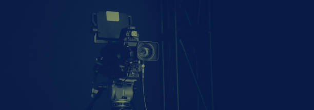 istock TV Camera broadcast on the crane tripod for shooting or recording and broadcasting content in studio production to on air tv or online internet live show. HD Video recording on crane. Selective focus. 1455660946