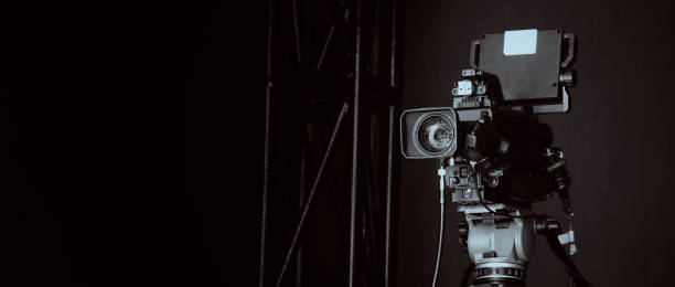 istock TV Camera broadcast on the crane tripod for shooting or recording and broadcasting content in studio production to on air tv or online internet live show. HD Video recording on crane. Selective focus. 1455660947