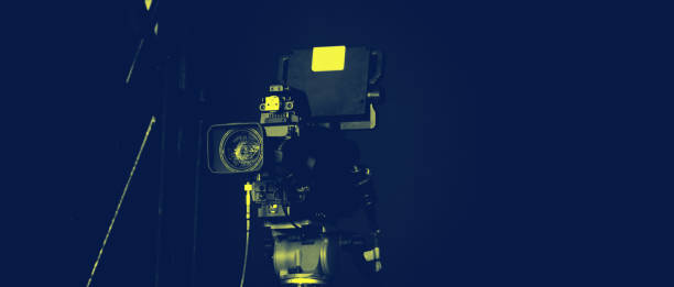 istock TV Camera broadcast on the crane tripod for shooting or recording and broadcasting content in studio production to on air tv or online internet live show. HD Video recording on crane. Selective focus. 1455660948