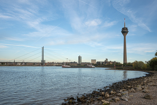 Düsseldorf, Germany - November 10, 2022: Inland navigation vessels passing Dusseldorf on the Rhine river on November 10, 2022 in Germany, Europe