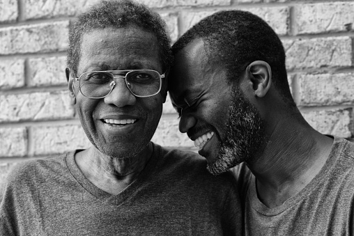 Father and son sharing a laugh together.