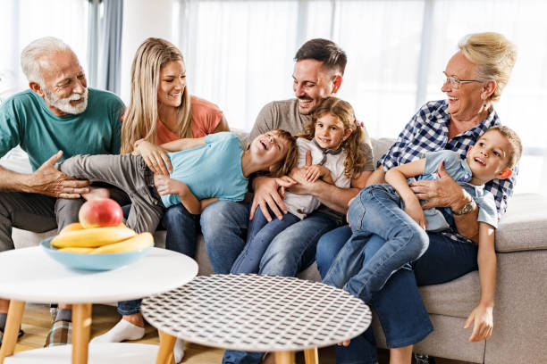 istock Cheerful extended family having fun together at home. 1455675902