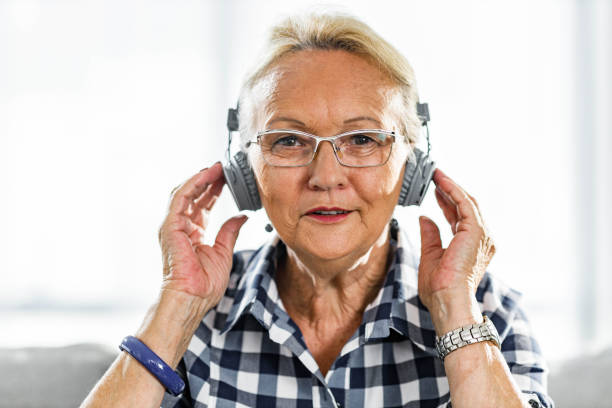 istock Senior woman having a video call at home. 1455676045