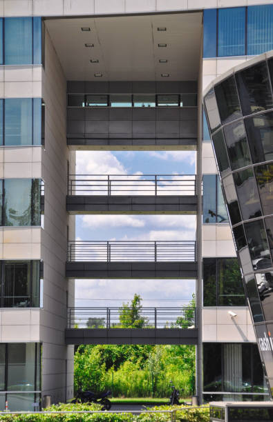 istock blue glass wall of office building mirror reflection platforms 1455677447