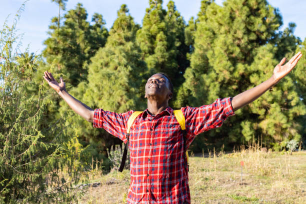 istock African man happy in nature. 1455677518
