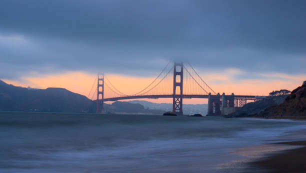istock Golden Gate Bridge over the water at sunset in San Francisco 1455677912