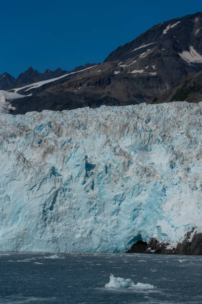 istock Beautiful glacier on water against the rocky mountain 1455677923