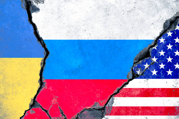 istock Russia Ukraine and USA flag on broken wall crack for conflict relation among three countries concept. 1455680486